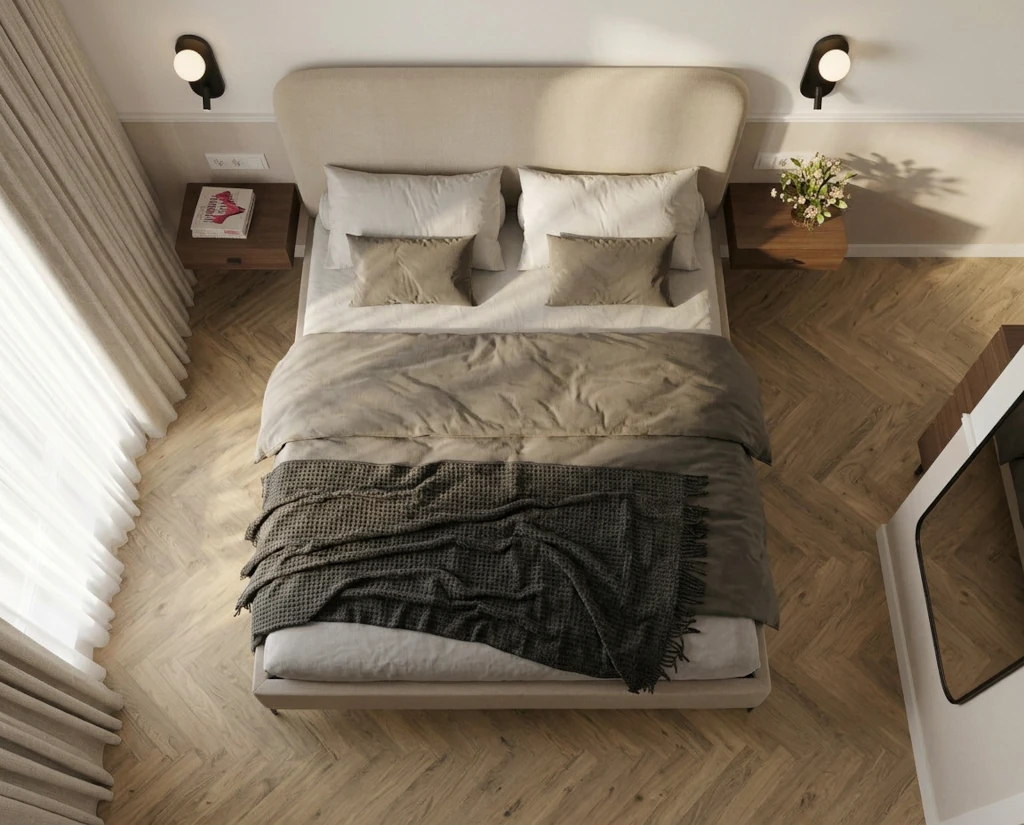 Sypialnia z tapicerowanym beżowym łóżkiem